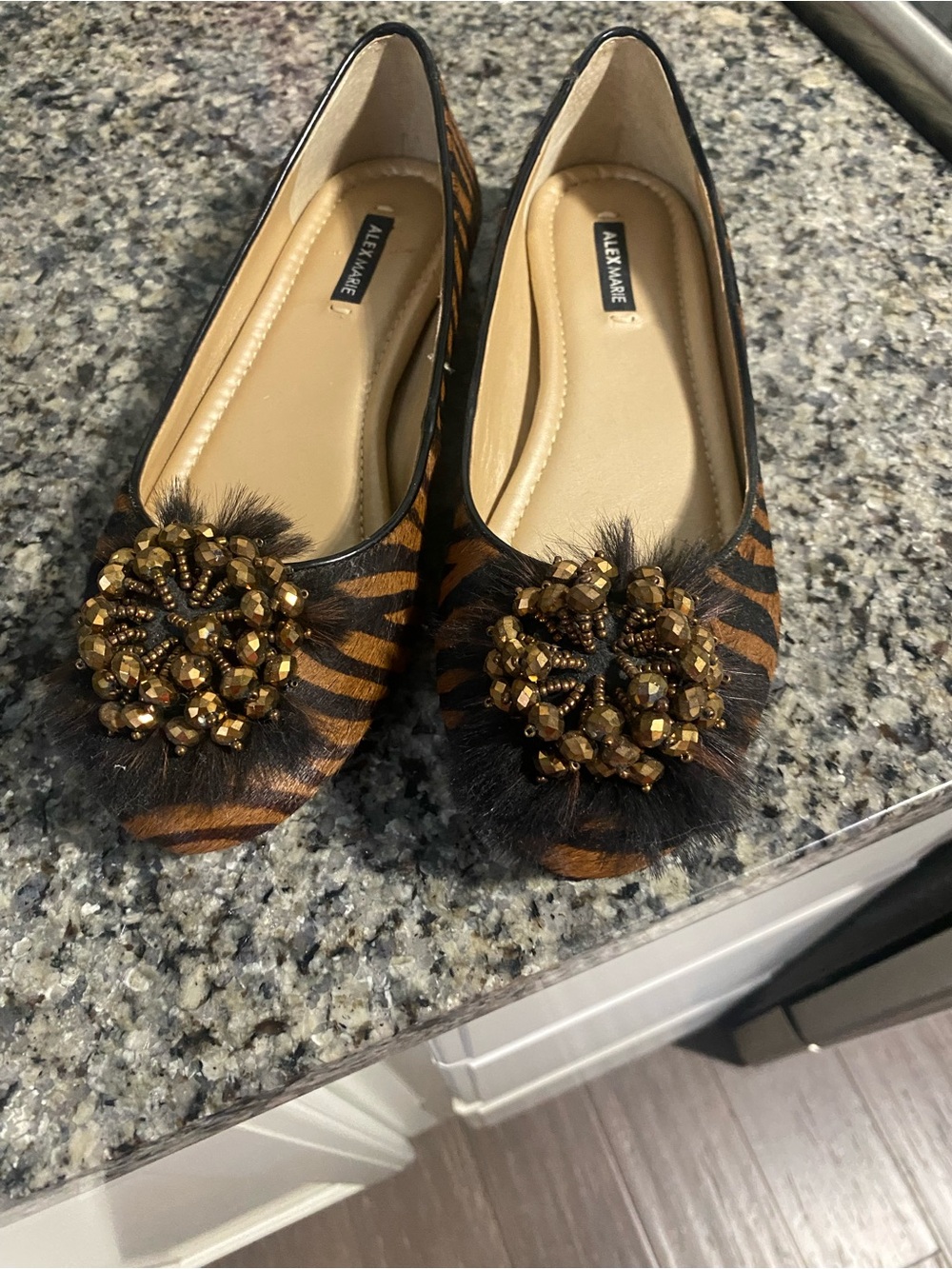 Alex Marie Tiger-Print Embellished Flats in Brown and Black.
